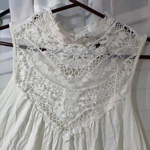 White Sleeveless w/ lace on top and bottom fringe